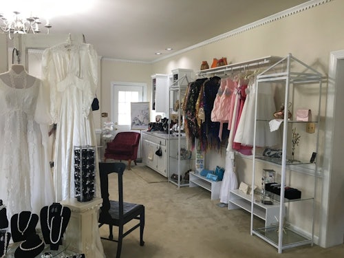 Bridal Boutique with racks of wedding dresses and accessories